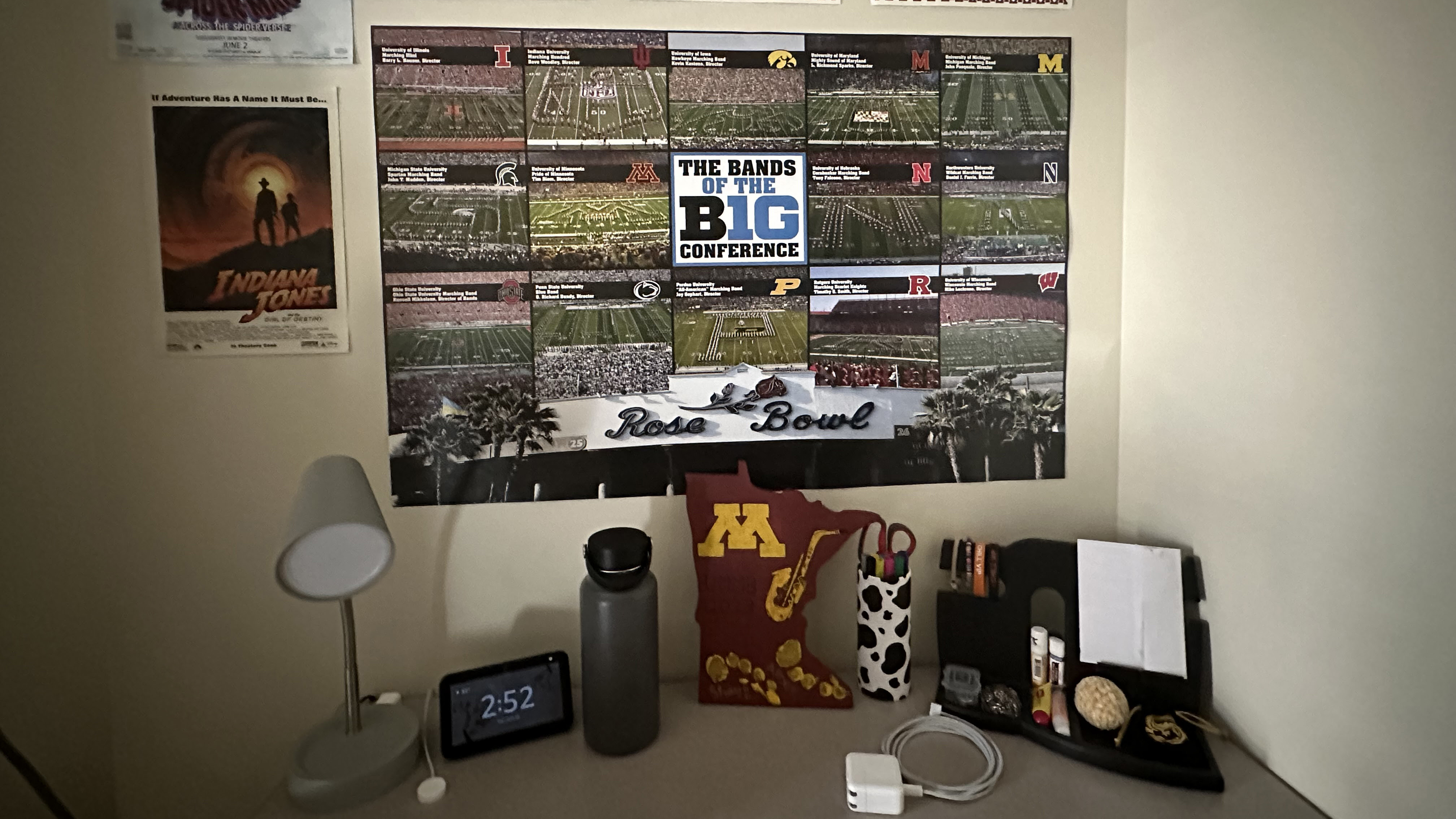 2024 Goldy Room. Desk with U of M themed posters behind it on the wall.