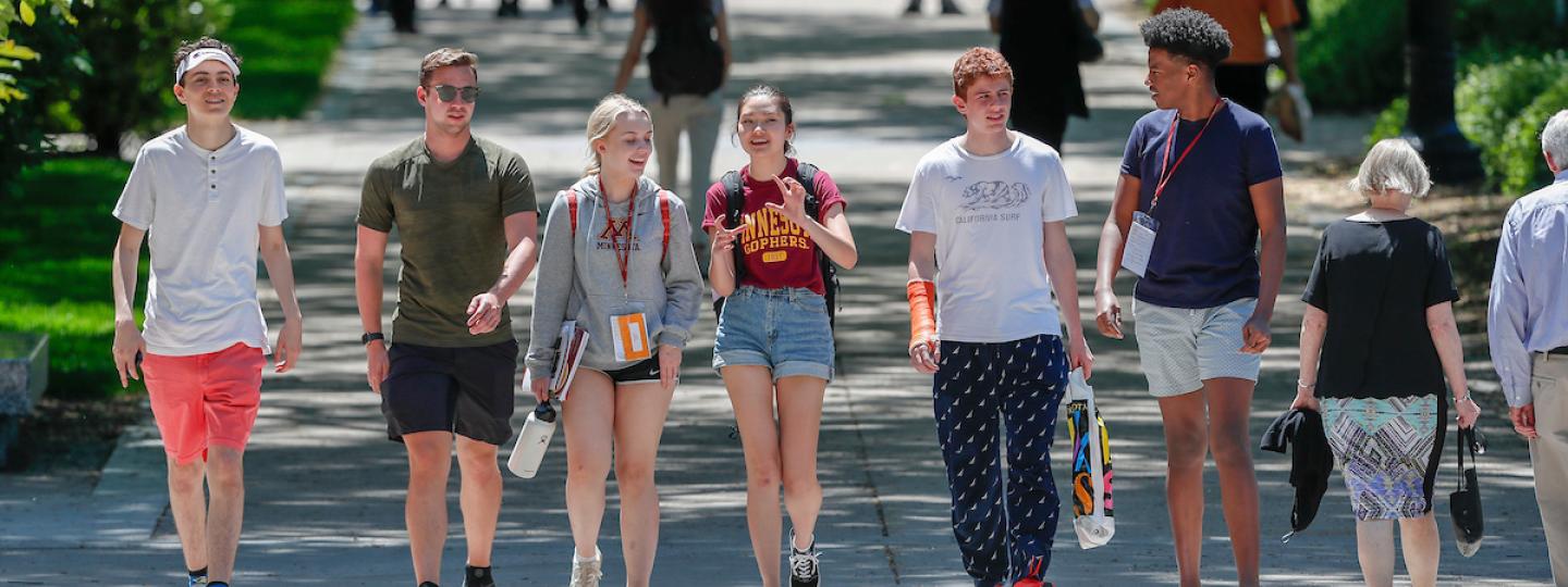 Students walking down the campus mall