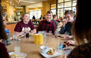Group of students sitting together at the 17th dining hall