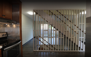 View of staircase inside a Pillsbury Court unit