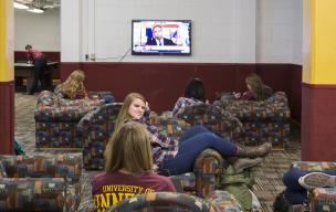 Students using Centennial Hall's game lounge.