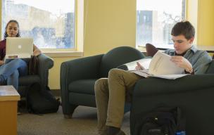 Students studying in the hall's lounge.