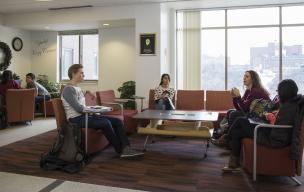 Students lounging in the main lobby.