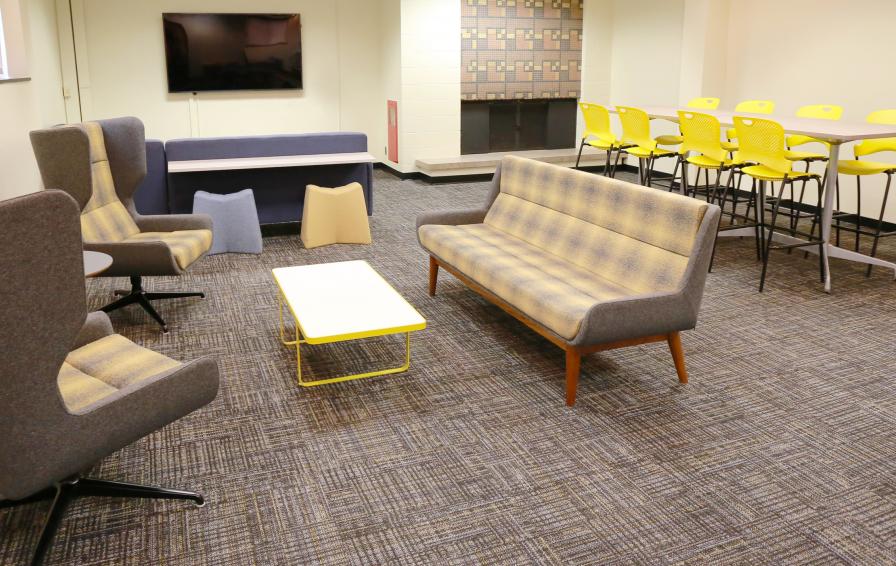 Territorial Hall rec room with a variety of new seating
